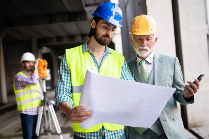 group-of-construction-engineer-working-in-construc-HSPQ87J.jpg