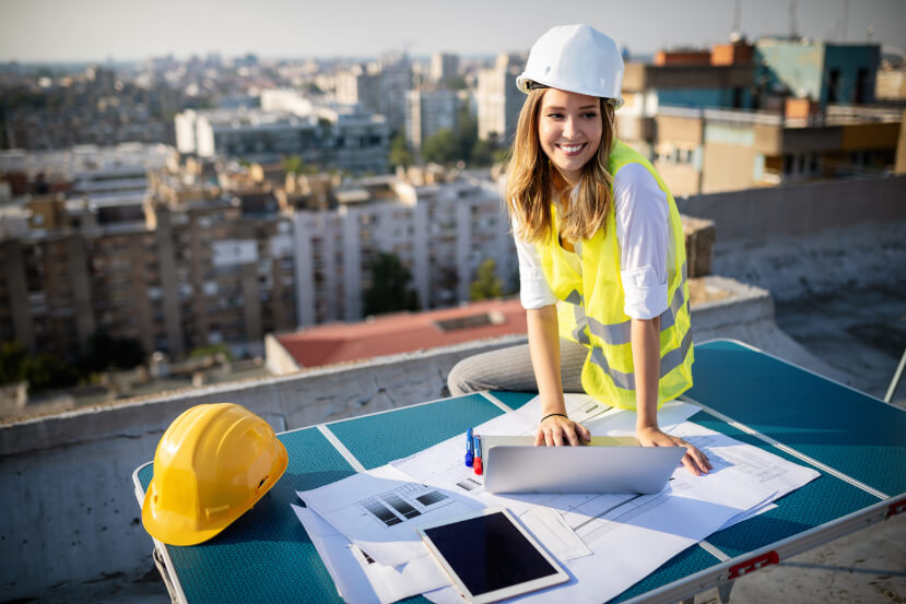 young-woman-architect-construction-engineer-at-a-c-H35KT6E.jpg